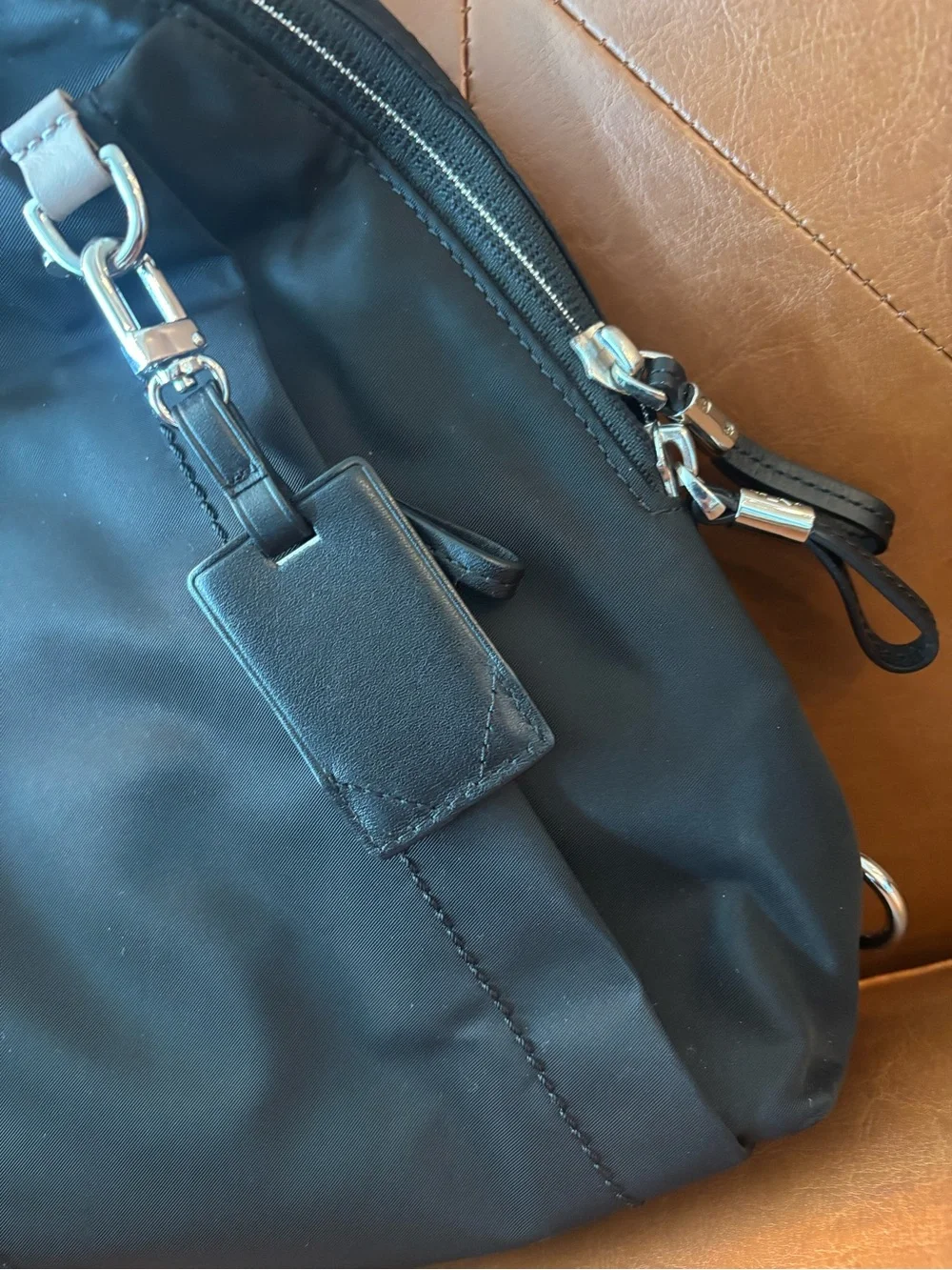 Tumi compact sling